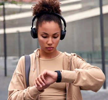 Woman listening to podcast on Apple Watch