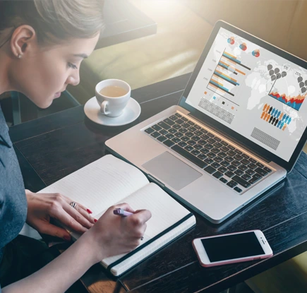 Woman using laptop operating system