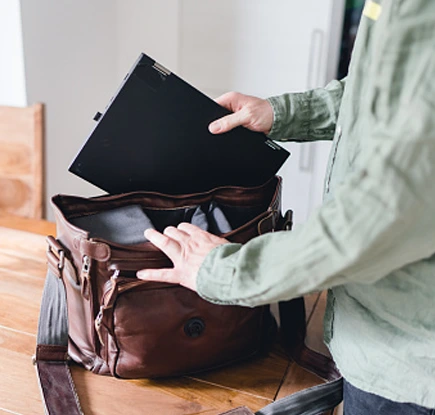 Placing Chromebook in carrying bag