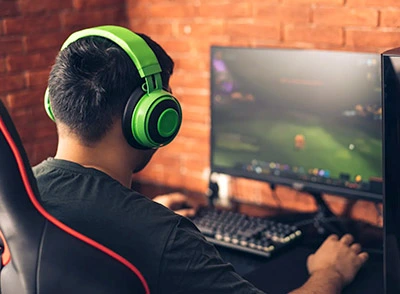 Gamer playing on PC Desktop