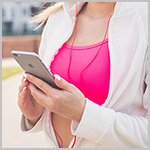 Woman exercising with an iPhone