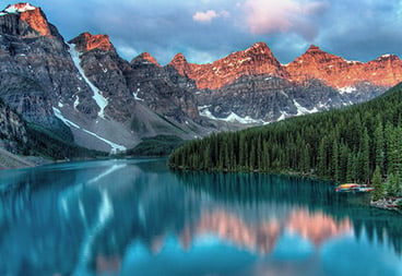 Mountains and Forest Trees on Lake Nature Scene