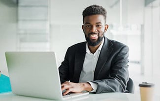 Business Man using Laptop, Business Device Extended Service Plans