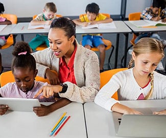 K-12 Students in Classroom using Laptops and iPads, K-12 School Device Extended Service Plans